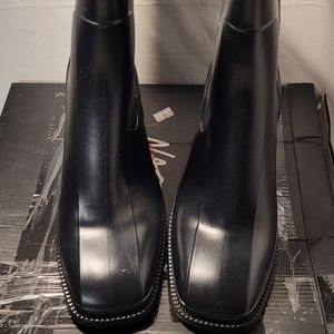 Nasty gal. Black pull on raincoats size 7